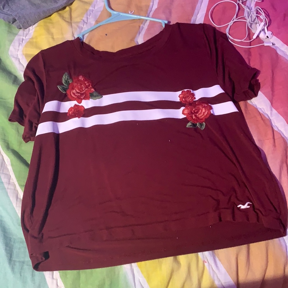 T-shirt with stripes and roses on it